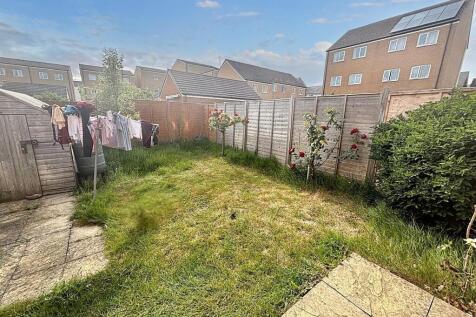 A bright and inviting garden space with a well-...
