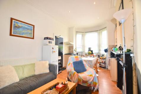 Bright and inviting living area featuring a com...