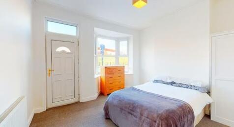 Bright and inviting double bedroom featuring a ...