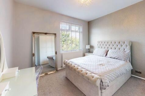 Bright and inviting double bedroom featuring a ...