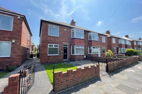 Charming terraced house with a neat front garde...