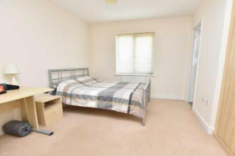 Bright and tidy double bedroom featuring a larg...