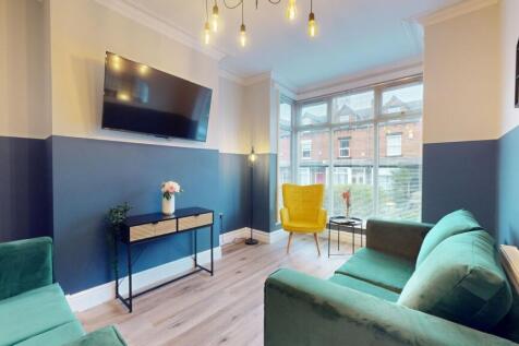This contemporary living room features stylish ...