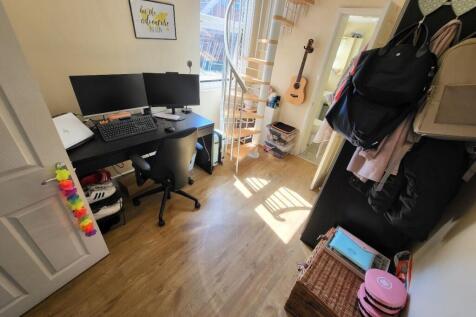 Bright and well-organized communal workspace fe...