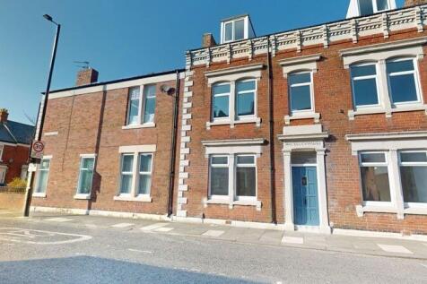 Bright and well-maintained terraced brick house...