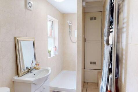 A bright and modern bathroom featuring a clean ...