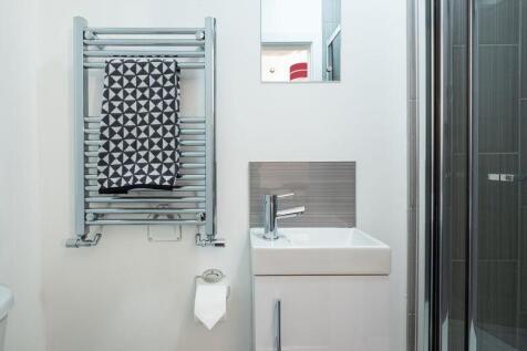 A modern and well-maintained bathroom featuring...