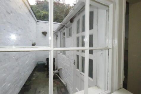 A view through a multi-pane window showcasing a...