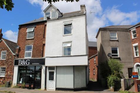 Charming street-front of a traditional terraced...