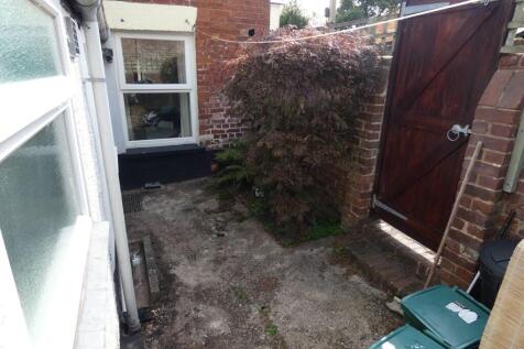 A charming small outdoor area at the front of t...