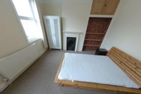 Bright and tidy double bedroom featuring a larg...