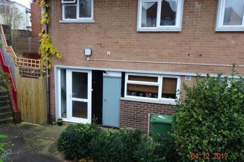 A neat and well-maintained front exterior of a ...