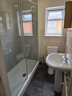 A neat and well-maintained bathroom featuring a...
