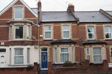 Front view of a traditional terraced brick hous...