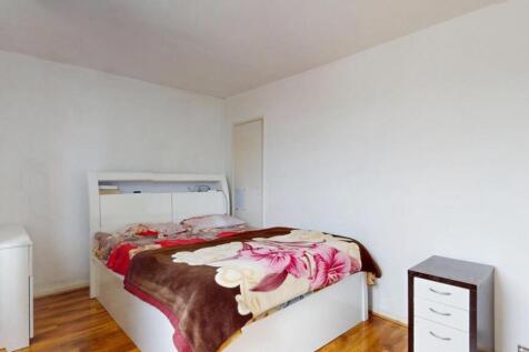 Bright and cozy double bedroom featuring a comf...