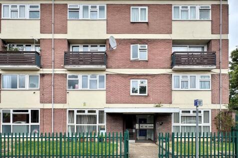 A well-maintained terraced residential building...