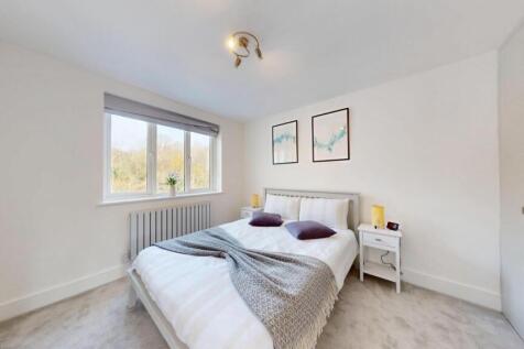 Bright and inviting double bedroom featuring a ...