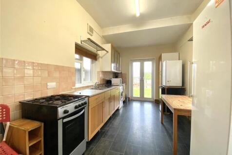 Spacious kitchen featuring ample counter space,...
