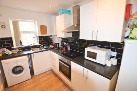 Bright and functional kitchen featuring modern ...
