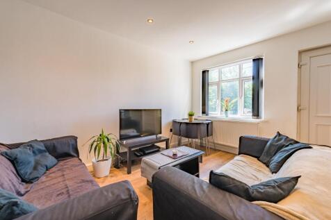 A cozy living room featuring two comfortable so...