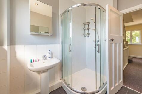 Bright and clean bathroom featuring a modern co...