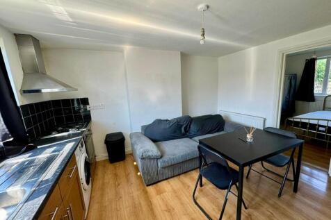 Bright and functional kitchen area featuring mo...