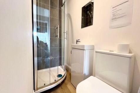 A modern and well-maintained bathroom featuring...