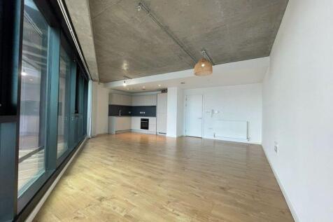 Bright and spacious contemporary living room wi...
