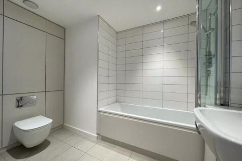 A modern and well-maintained bathroom featuring...