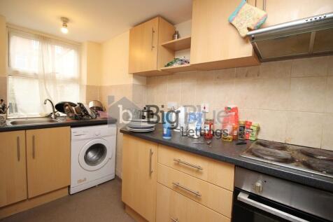 Bright and functional kitchen featuring ample c...