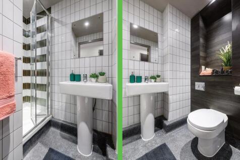 A modern and stylish bathroom featuring a sleek...