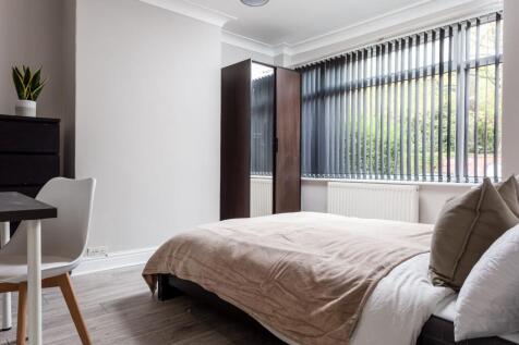 Bright and inviting double bedroom featuring a ...