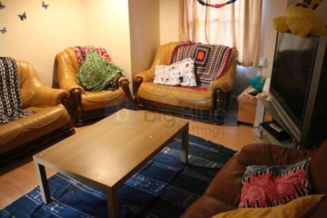 Cozy living room featuring comfortable leather ...
