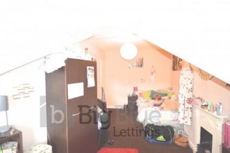 A compact and functional single toilet room wit...