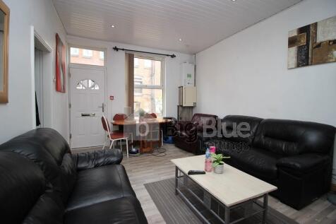 Bright and inviting living room featuring comfo...