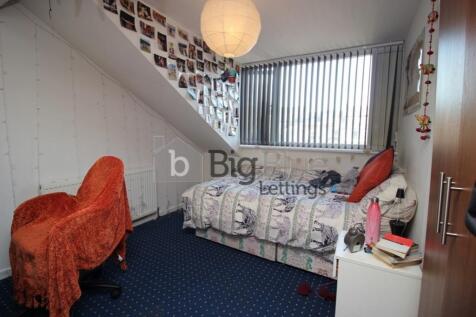 Cozy single bedroom with a comfortable bed, amp...