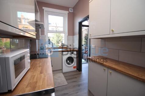 Bright and functional kitchen featuring modern ...