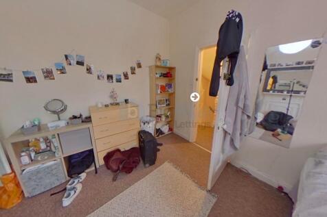 A compact and tidy student space featuring a sm...