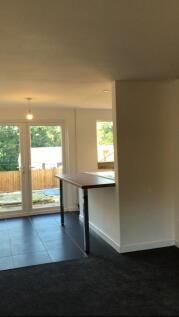 A bright and modern living room area featuring ...