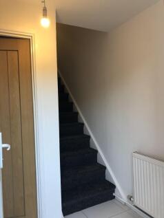A clean and well-maintained staircase featuring...