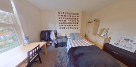 Bright and inviting double bedroom featuring a ...