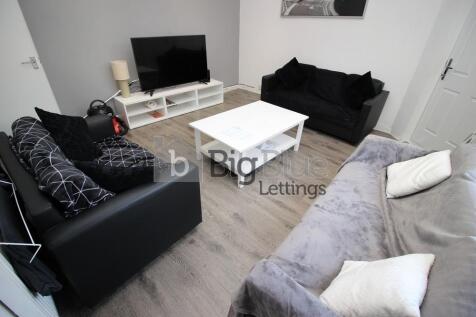 A modern and inviting living room featuring com...