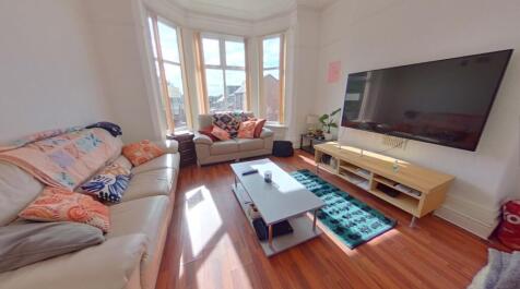 Bright and welcoming living room featuring a sp...