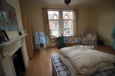 Bright and inviting master bedroom featuring a ...