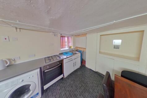 A practical kitchen space featuring essential a...