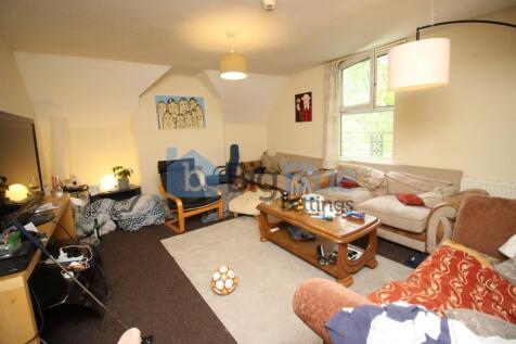 Cozy and inviting living room with ample seatin...