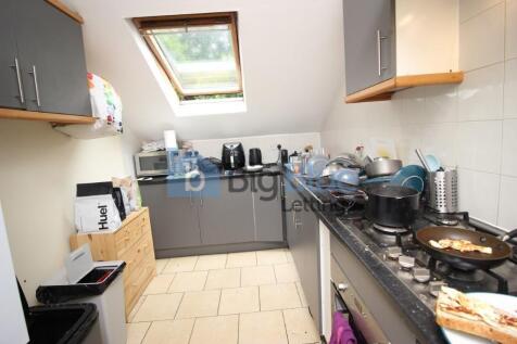 Bright and functional kitchen with modern grey ...