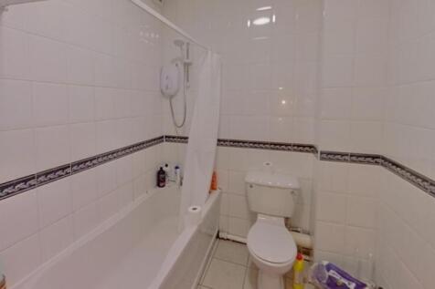 Bright and clean bathroom featuring a full bath...