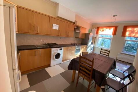 Bright and functional kitchen featuring ample c...