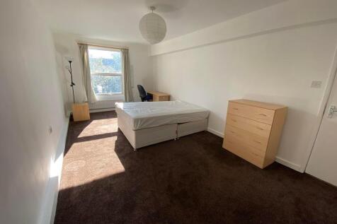 Bright and inviting double bedroom featuring a ...